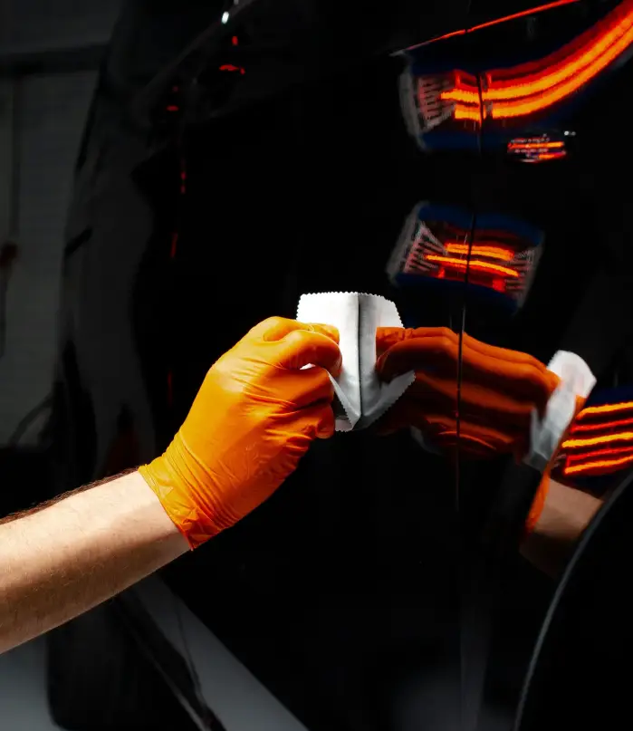 car-polish-wax-worker-hands-polishing-car